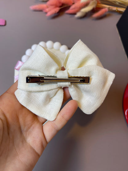 FIOCCO CON ROSELLINE E PERLINE